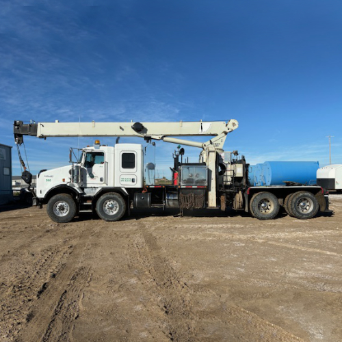 enviroex 30 ton picker parked in yard