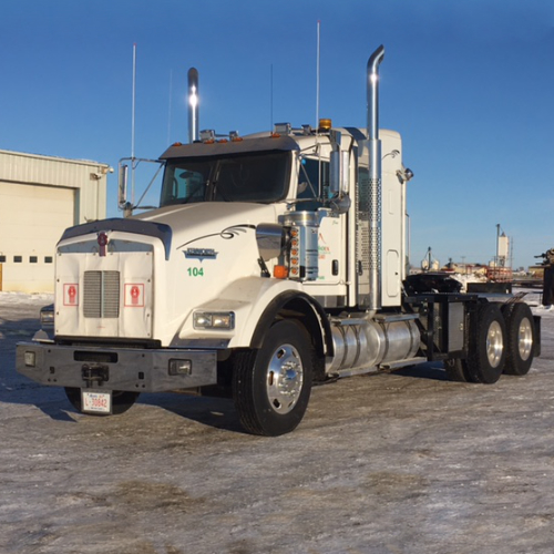 The front of enviroex pipe hauling tractor unit 104