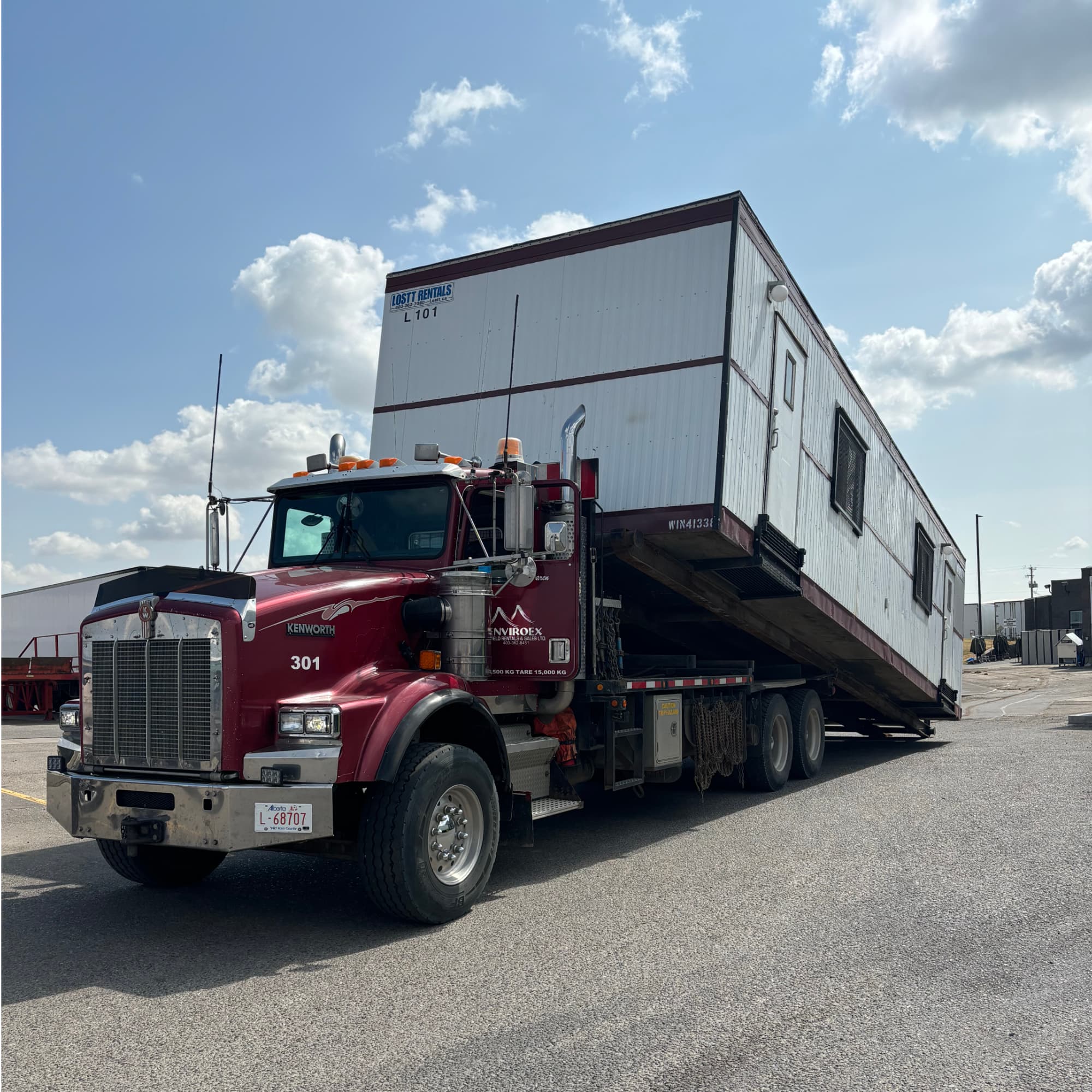 Enviroex which tractor unloading the office trailer