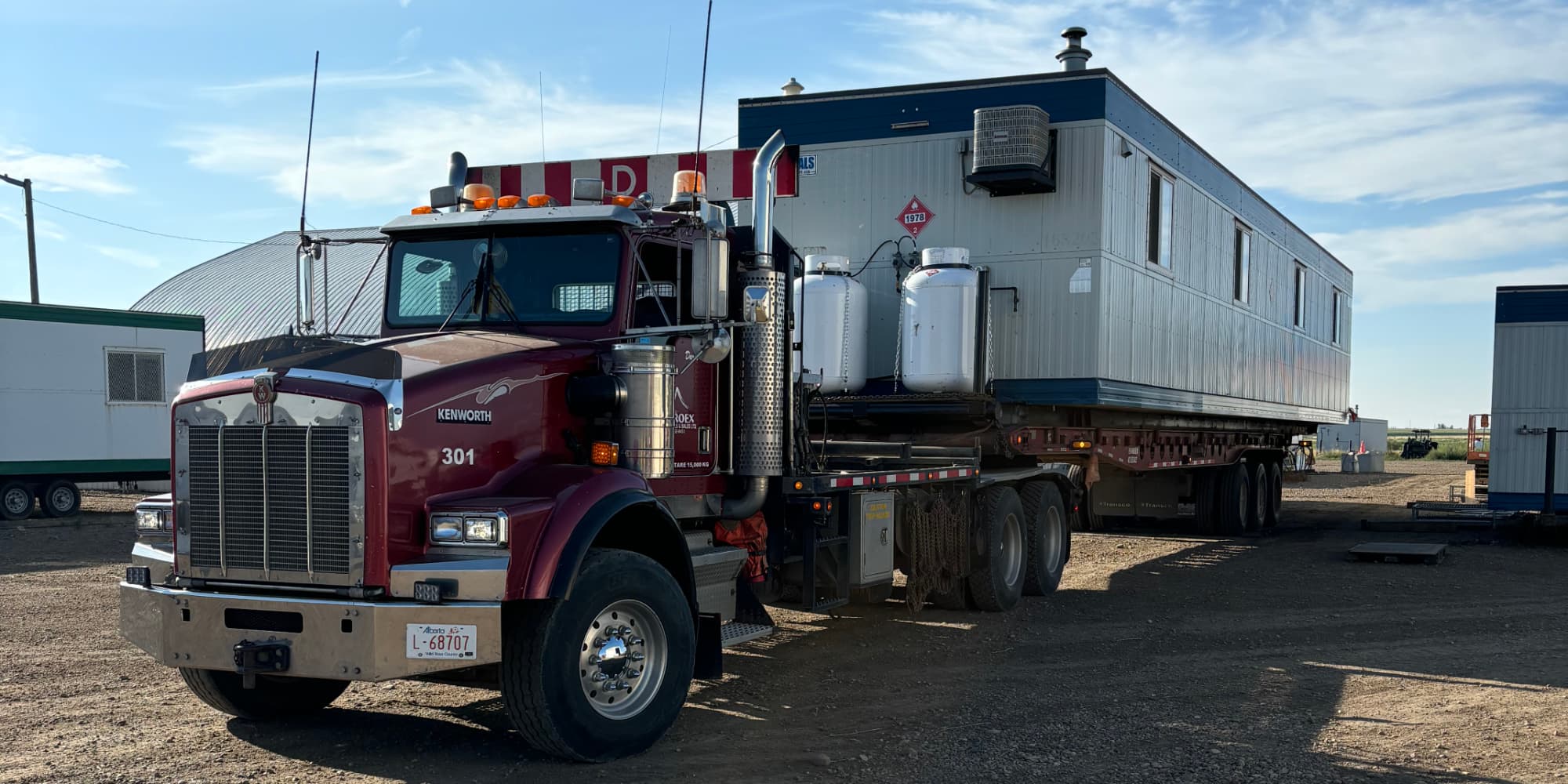 Tractor hauling shack for oilfield