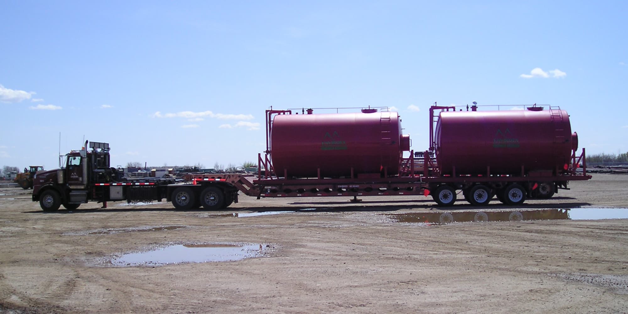 tractor with texas trailer and two 300 blow back tanks